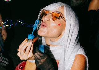 TiNK rave and festival sunglasses worn at night